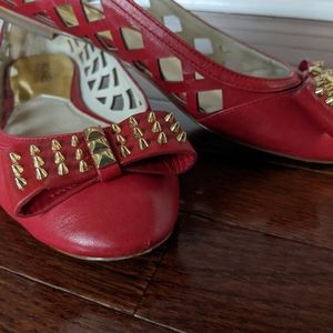 Red leather, Michael Kors flats.